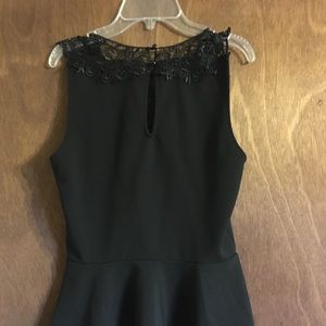 Black and Lace peplum. NEVER WORN